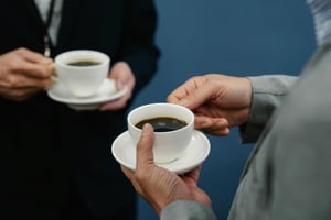 People having a chat over coffee